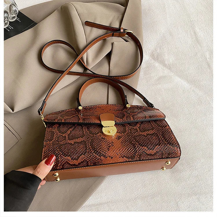 Fashion Handbag 2024 Wwomen's New Crossbody Leather Purse Serpentine Pattern Designer Bucket Luxury Brand Solid Color Tote Bag